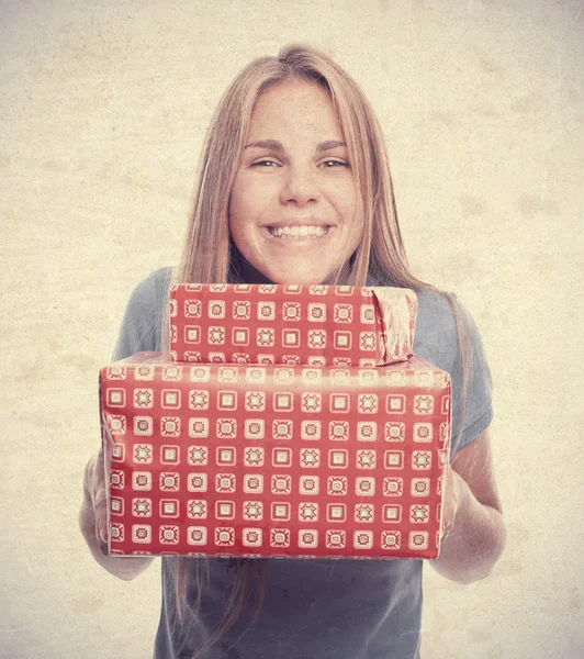 Junge coole Frau mit Geschenken — Stockfoto