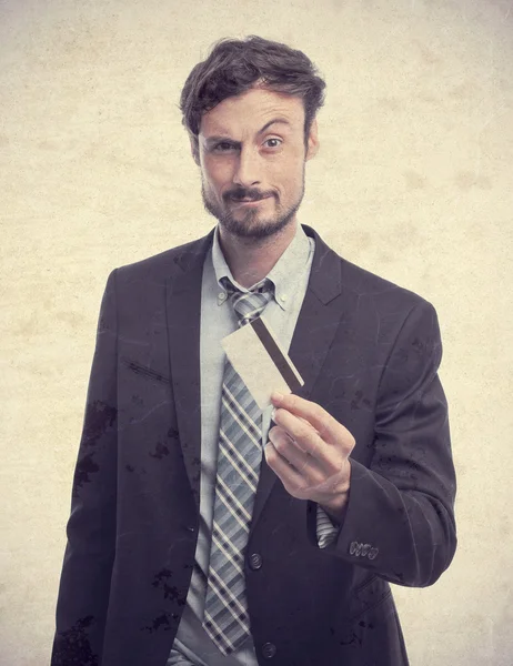 Young crazy businessman with a credit card — Stock Photo, Image