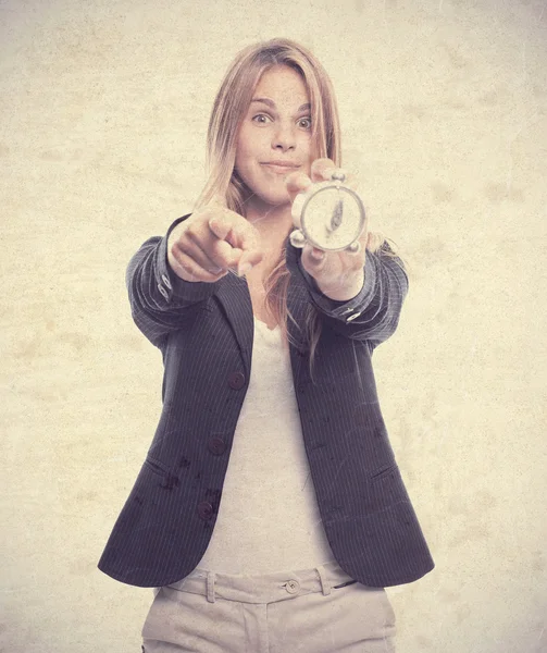 Joven cool mujer con un temporizador — Foto de Stock