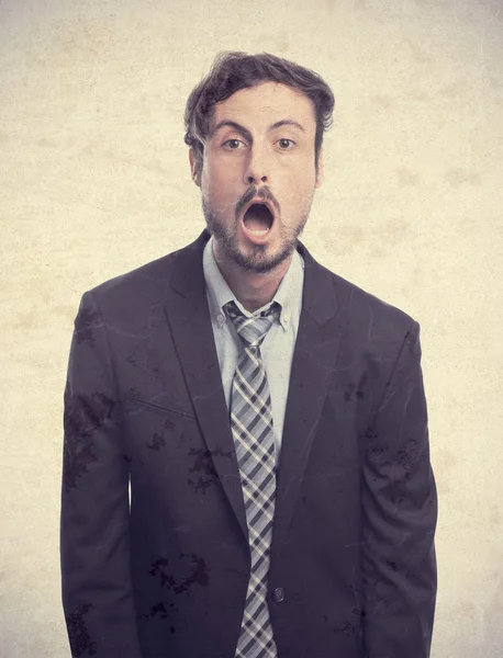 Young crazy businessman surprised face — Stock Photo, Image
