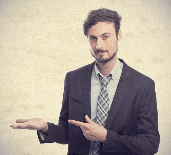 Young crazy businessman show gesture — Stock Photo, Image