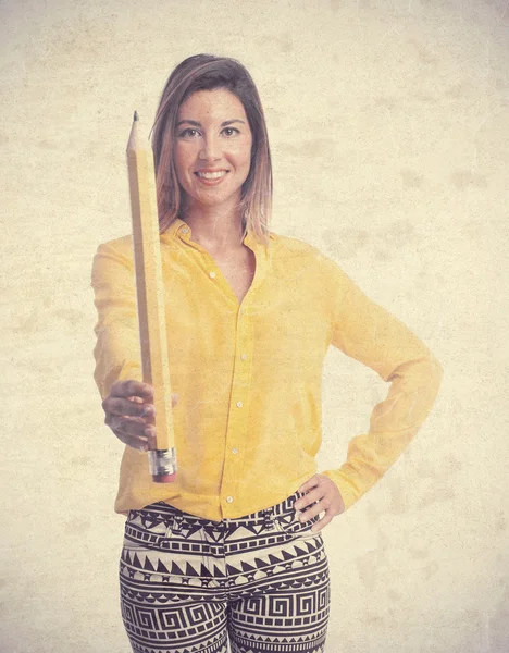 Joven cool mujer con un lápiz — Foto de Stock