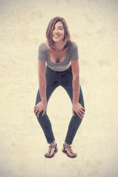 Young cool woman crouched — Stock Photo, Image