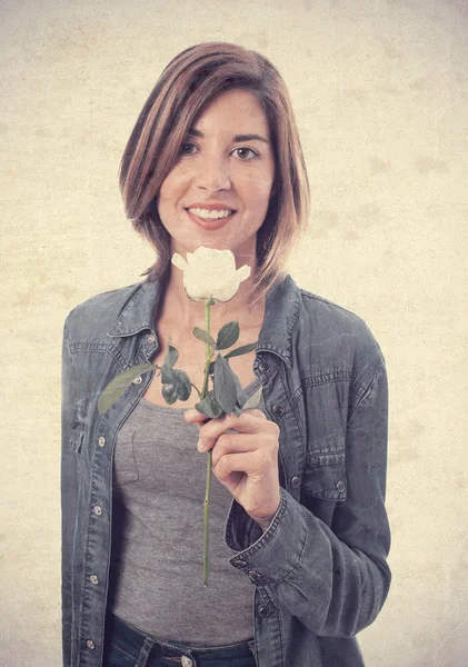 Joven cool mujer con una rosa —  Fotos de Stock