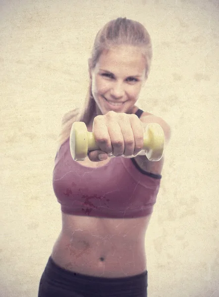 Jonge cool vrouw met een halter — Stockfoto