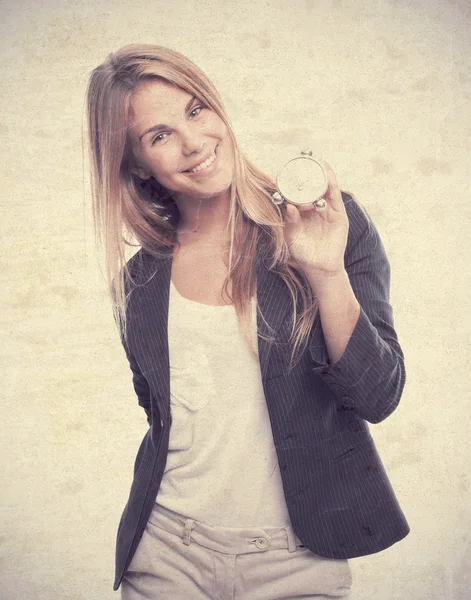 Joven cool mujer con un temporizador — Foto de Stock