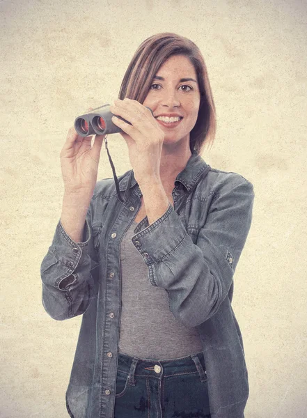 Young cool woman with binoculars — Stock Photo, Image