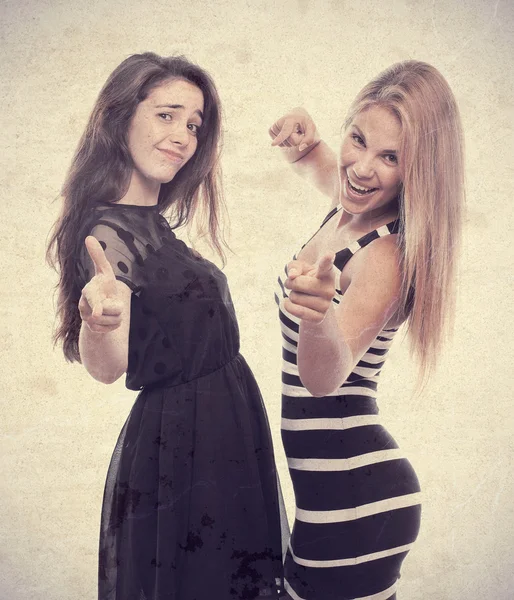 Young cool women pointing — Stock Photo, Image