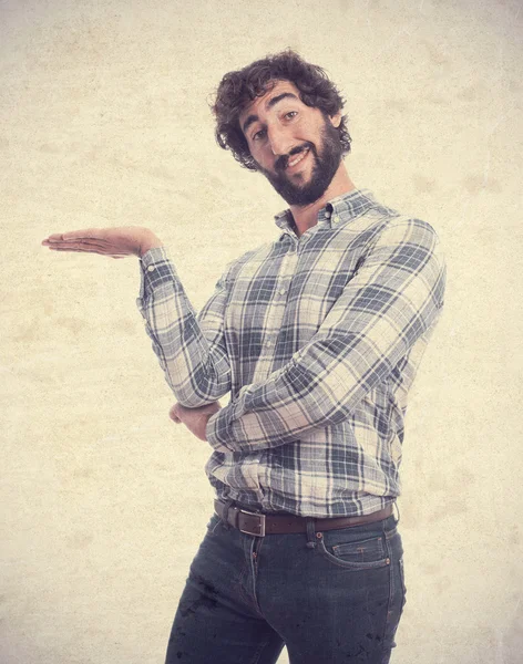 Young man showing — Stock Photo, Image