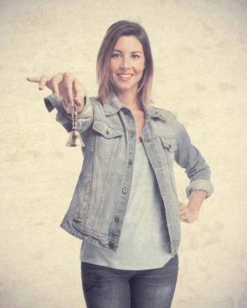 Young cool woman with a bell — Stock Photo, Image