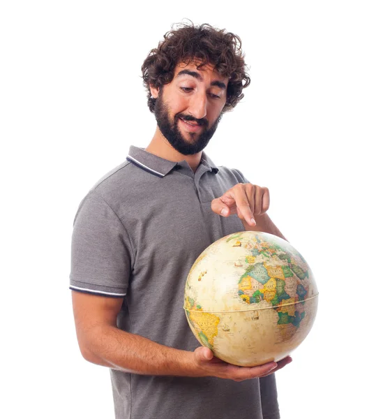 Jovem barbudo homem com globo mundial — Fotografia de Stock