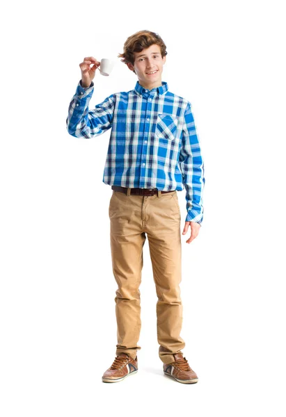 Teenager with cup of coffee — Stock Photo, Image