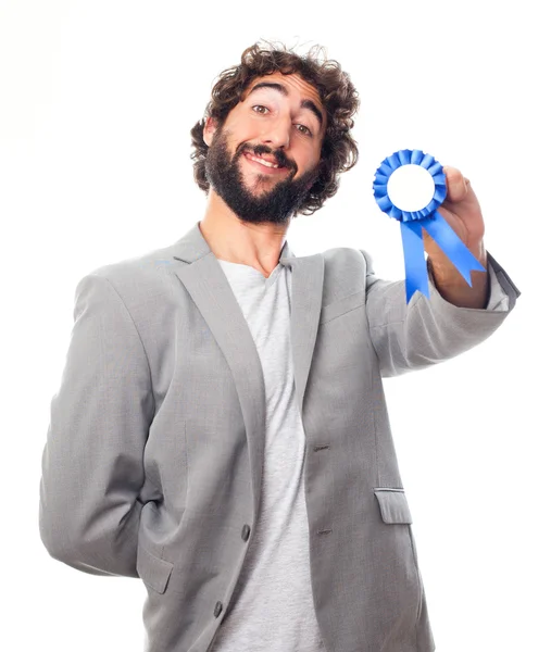 Young crazy man with a medal — Stock Photo, Image