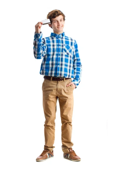 Teenager holding a credit card — Stock Photo, Image