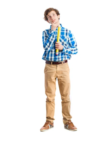 Adolescente segurando um lápis. gesto atencioso — Fotografia de Stock