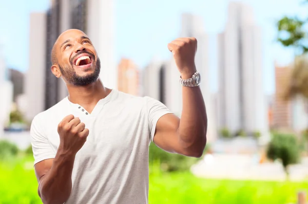 Young cool black man celebrating sign — Stock Photo, Image