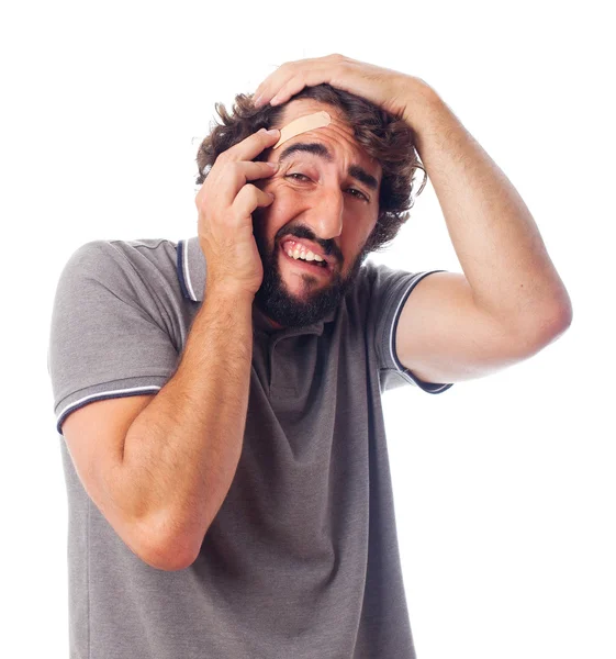 Young crazy man with head pain — Stock Photo, Image