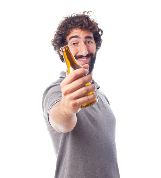 Young crazy man offering a beer — Stock Photo, Image