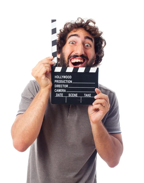 Jeune fou avec un clapperboard — Photo