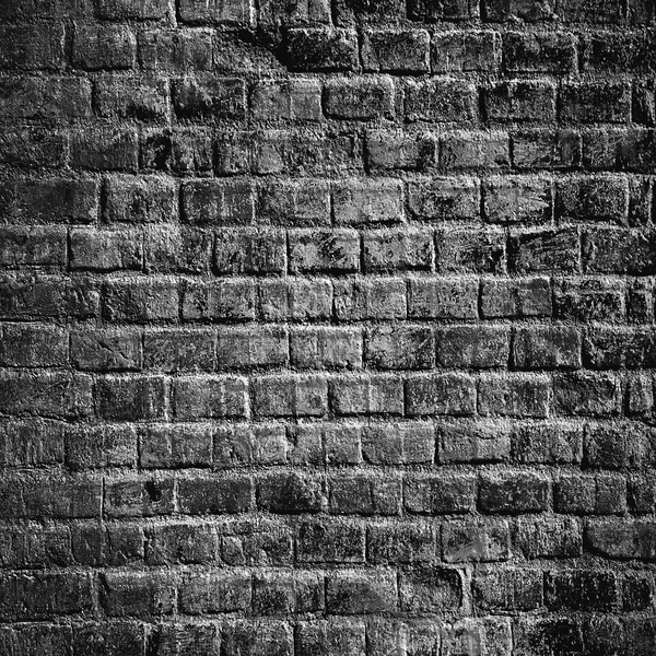 Zwarte stenen muur — Stockfoto