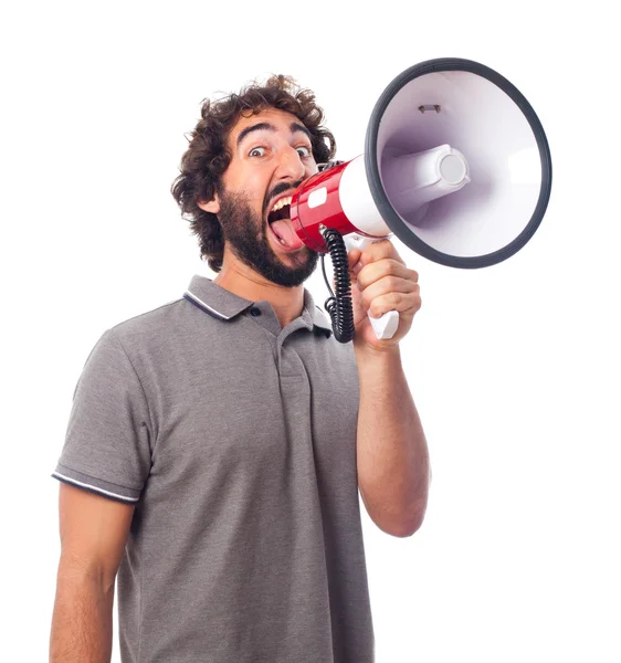 Joven loco gritando con un megáfono — Foto de Stock