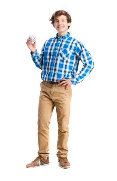 Teenager holding a die — Stock Photo, Image