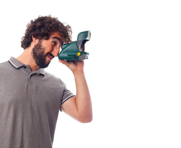 Young crazy man taking a photo — Stock Photo, Image