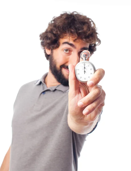 Bir kronometre ile genç deli adam — Stok fotoğraf