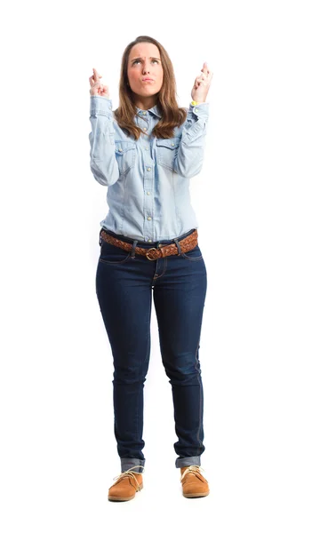 Young girl with fingers crossed — Stock Photo, Image