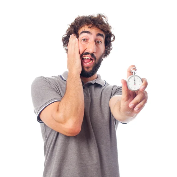 Gek jongeman met een stopwatch — Stockfoto