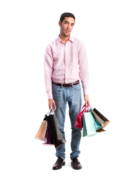 Guy holding a shopping bags — Stock Photo, Image