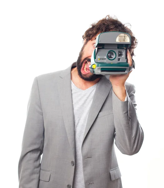 Young crazy man with a camera — Stock Photo, Image