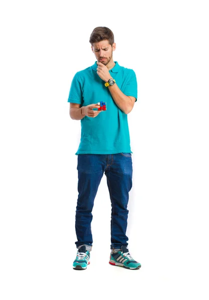 Guy with rubik's cube — Stock Photo, Image