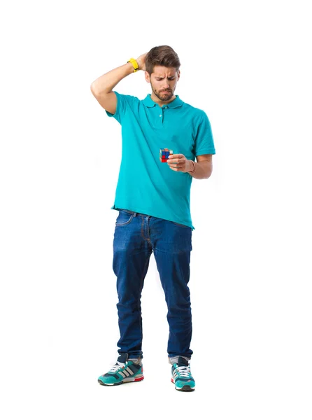 Menino com cubo de rubik — Fotografia de Stock