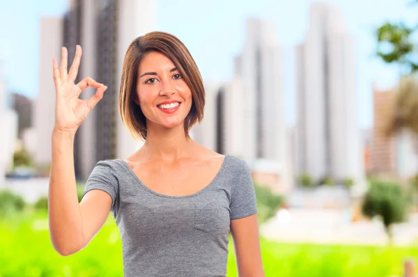 Young cool woman okay sign — Stock Photo, Image