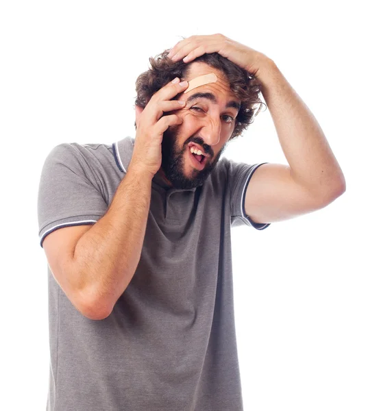 Young crazy man with head pain — Stock Photo, Image