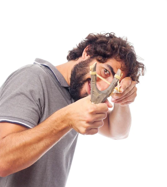 Young crazy man with a slingshot — Stock Photo, Image