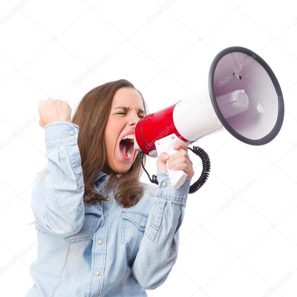 young woman shouting by megaphone