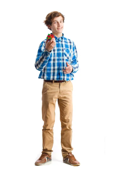 Teenager holding a rubik's cube — Stock Photo, Image