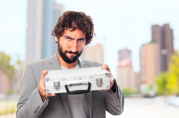 Young crazy man with a briefcase — Stock Photo, Image