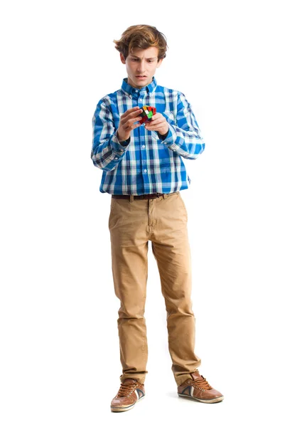 Teenager holding a rubik's cube — Stock Photo, Image