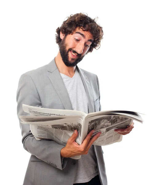 Joven loco con periódico — Foto de Stock