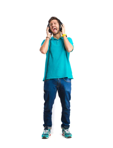 Niño cantando con auriculares — Foto de Stock