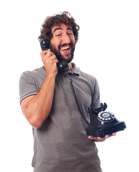 Young crazy man happy at phone — Stock Photo, Image