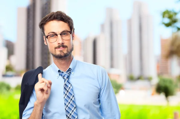 Junger verrückter Geschäftsmann in stolzer Pose — Stockfoto