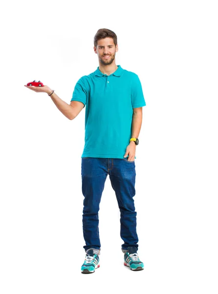 Guy holding a car toy — Stock Photo, Image