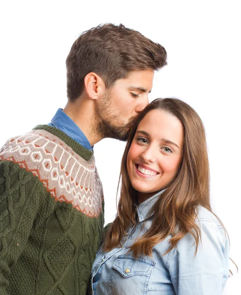 Young man kissing a woman. — Stock Photo, Image