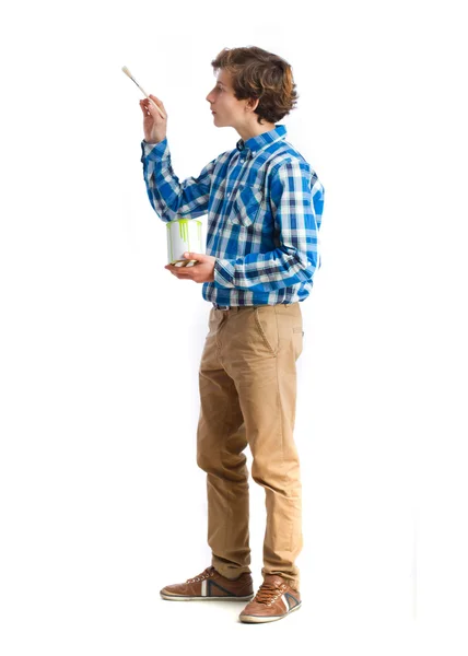 Teenager holding a paint can — Stock Photo, Image