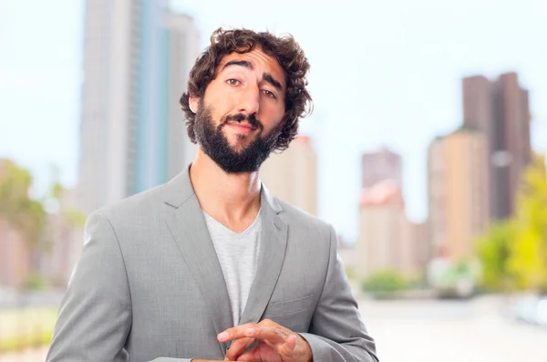 Young crazy man proud gesture — Stock Photo, Image