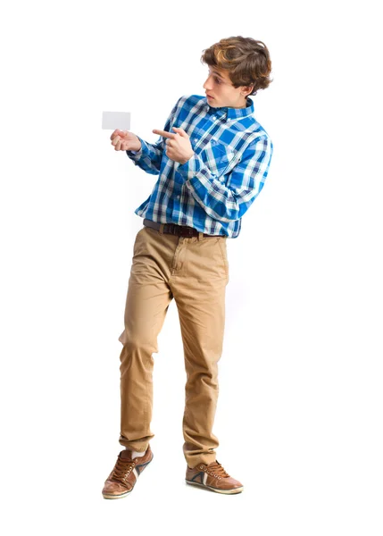 Teenager holding a name card — Stock Photo, Image